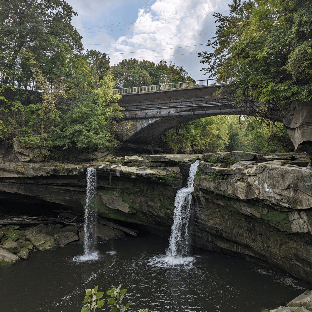 Waterfall with a bridge above at Cascade Park